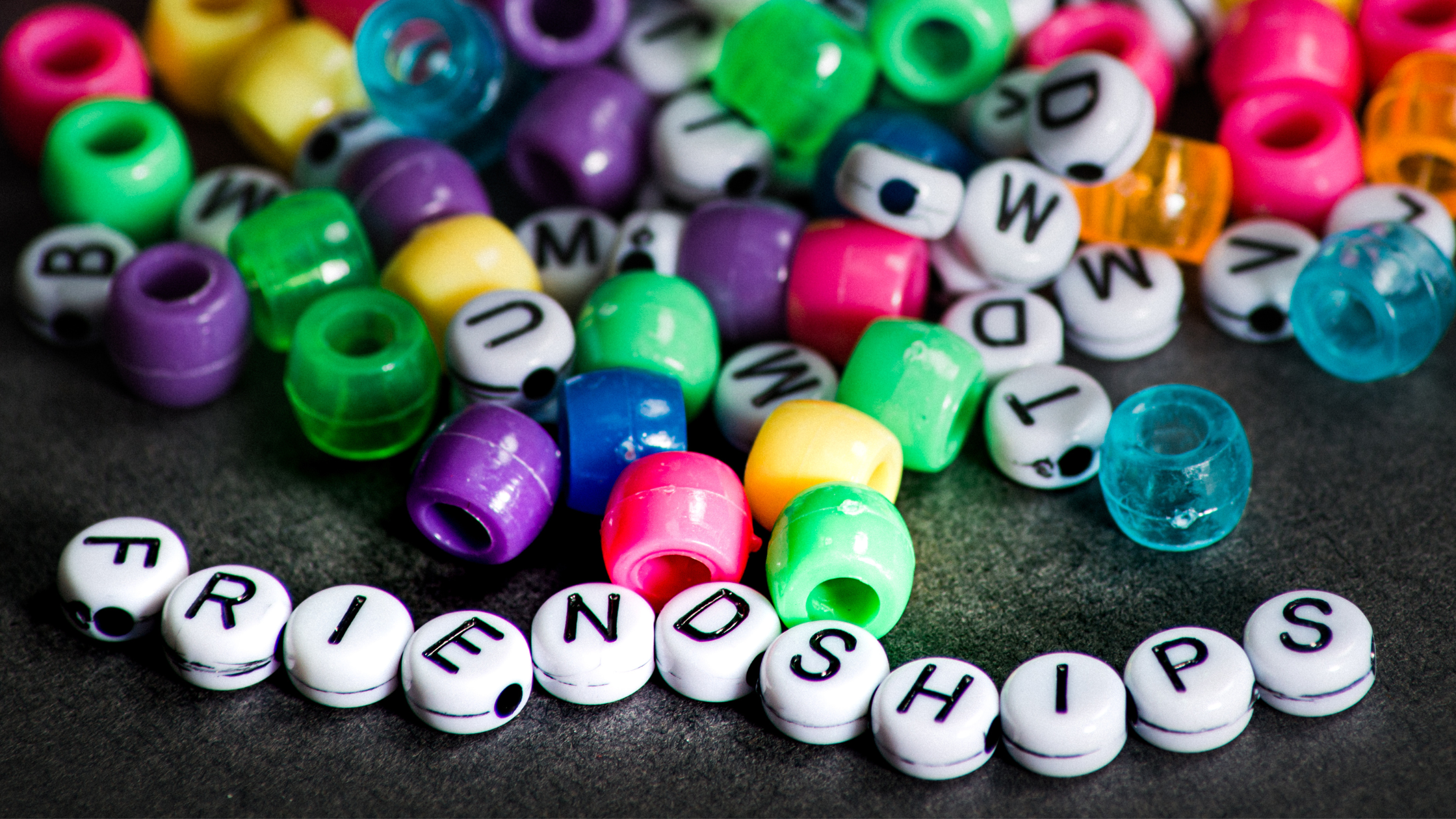 bracelet beads with the letters spelling friendships