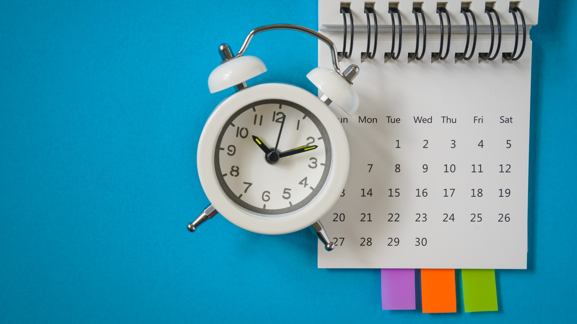 clock and calendar blue background