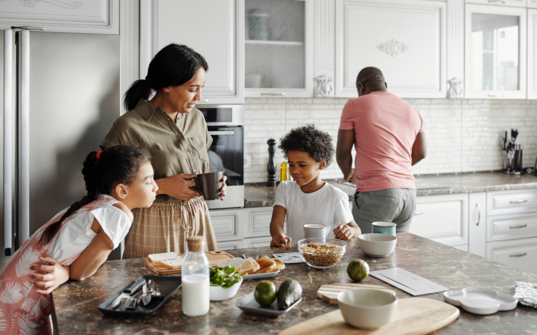 family cooking in kitchen