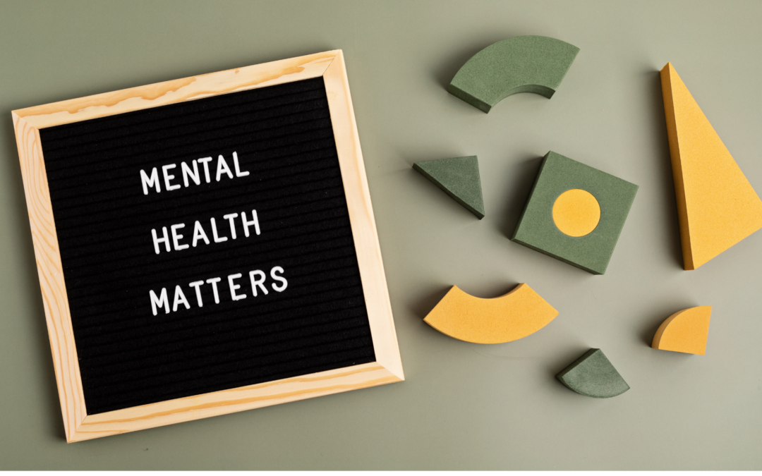 felt board with mental health matters on it next to wooden blocks